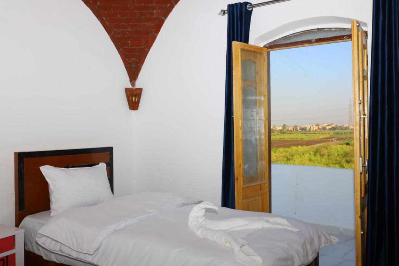 Quiet Gate Guest House Lel Agalta Extérieur photo